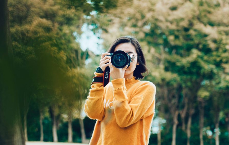 photographer taking a picture outside
