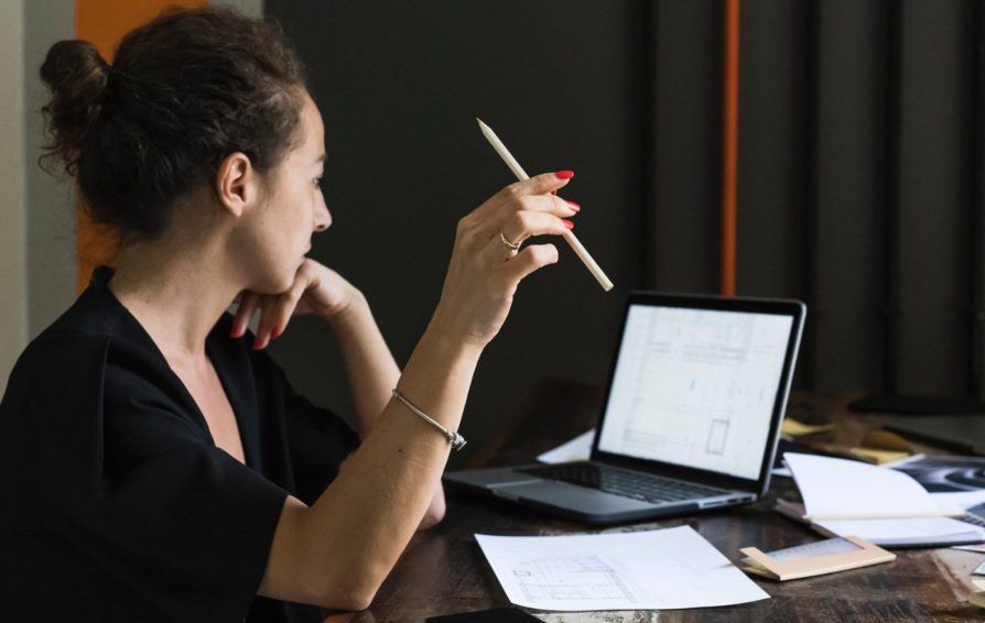 Woman conducting a project discovery session with new clients