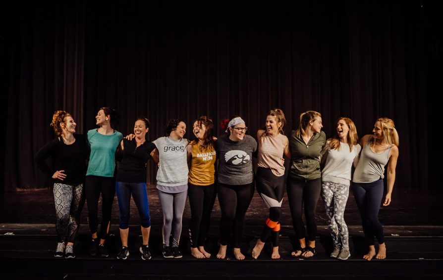 Group of women in athletic wear smiling