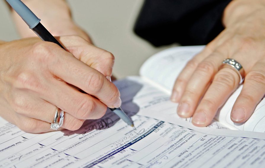 Person signing documents and registering their business