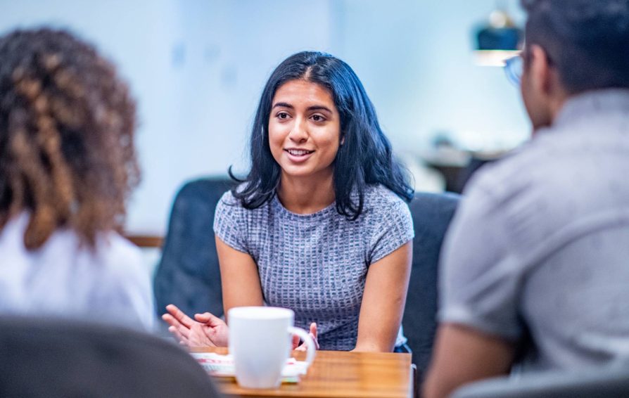 Business owner using relationship development strategies