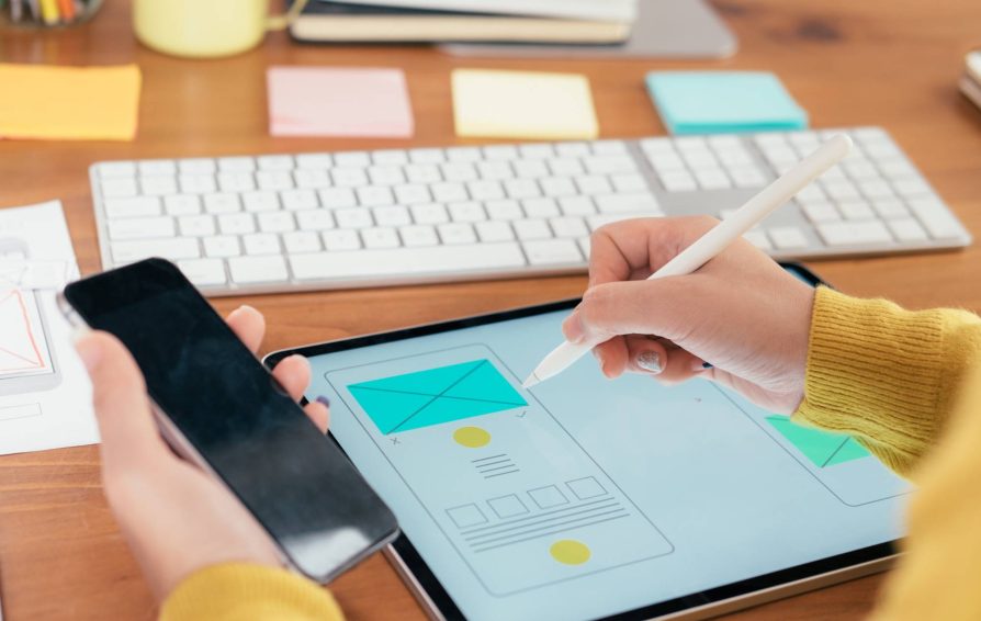 Person working on a sales brochure