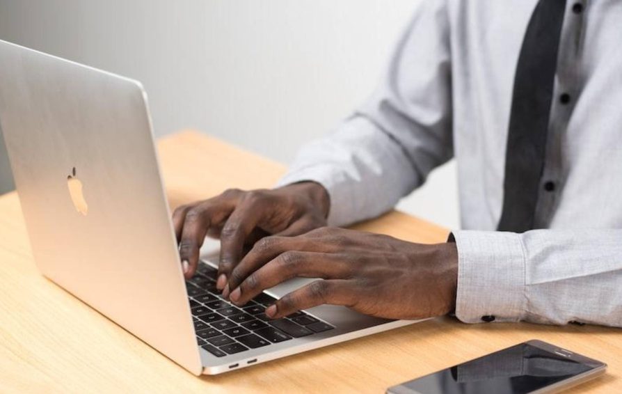 Person writing a service proposal