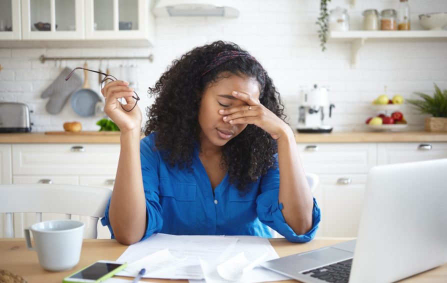 woman at her computer frustrated with email marketing