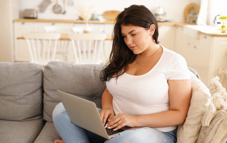 marketing lead working on email templates for her company's upcoming events
