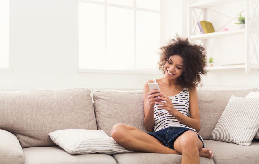 person setting up an email funnel on their phone