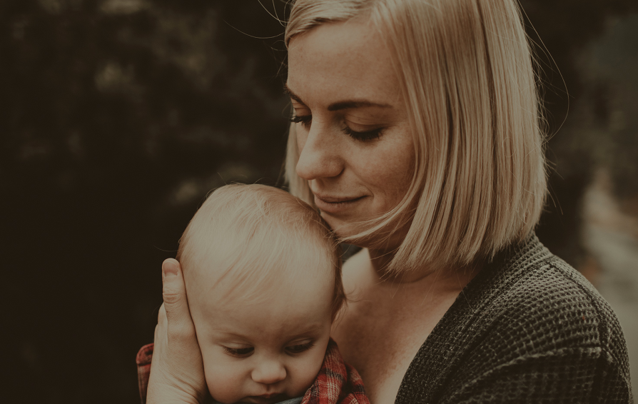 mother holding her baby