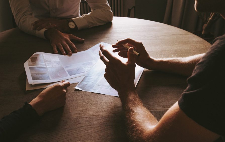 people working with an investment strategist