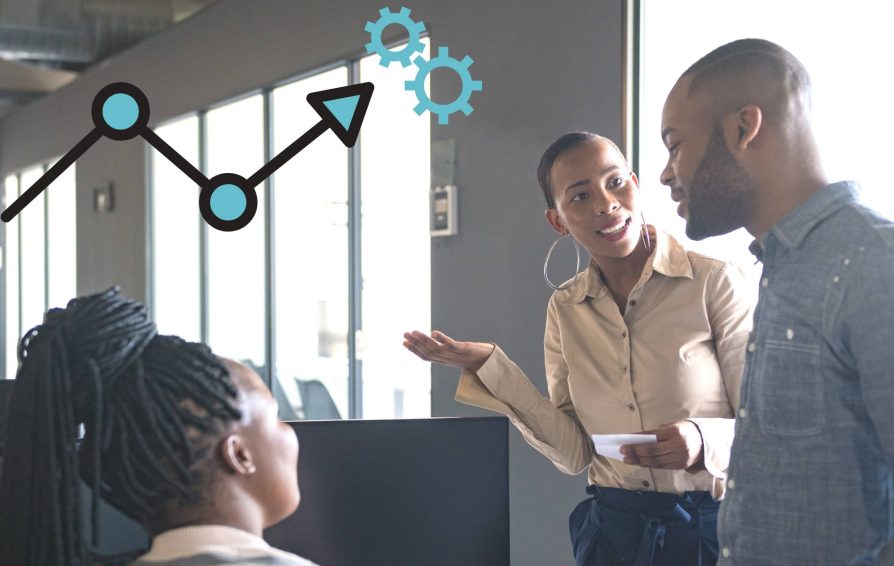Team members discussing a workflow
