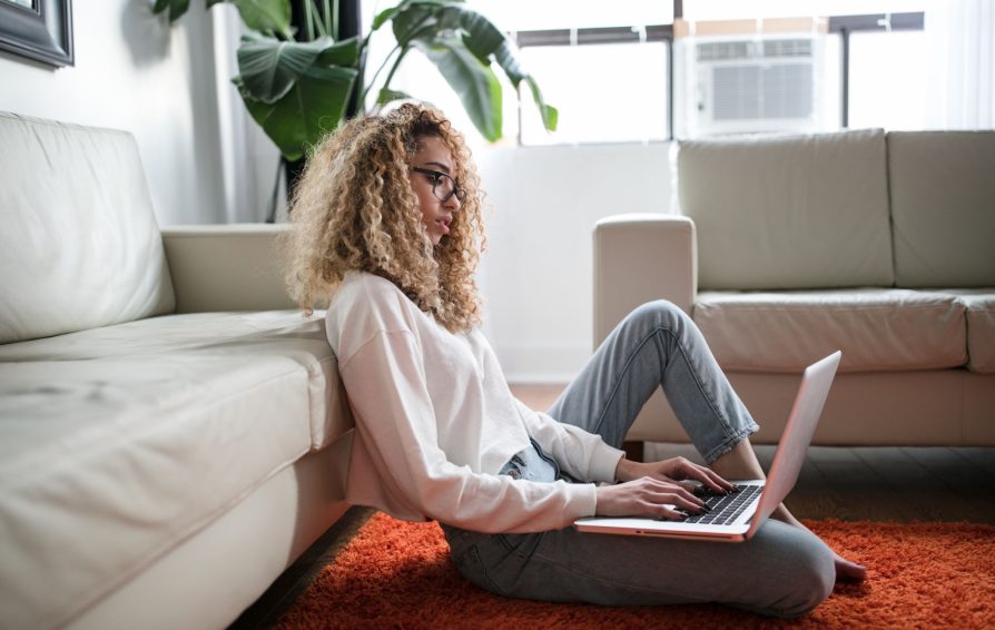 women working from home on her computer