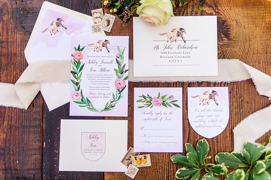 wedding in invitations on a wood table