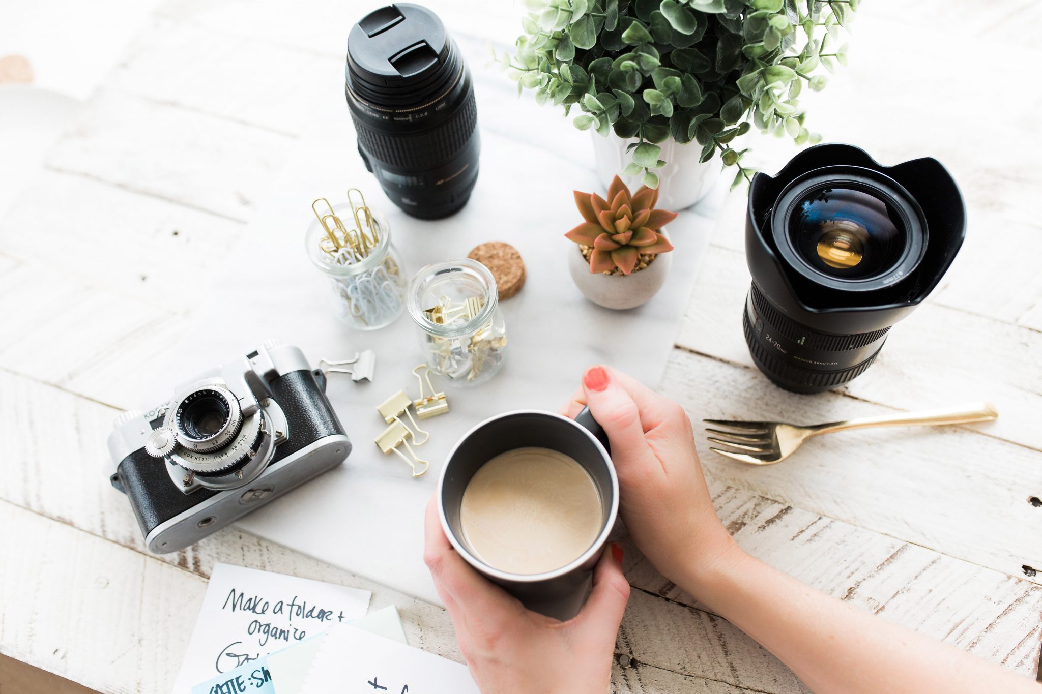 coffee on a photographers desk engaged followers - instagram first 1000 followers