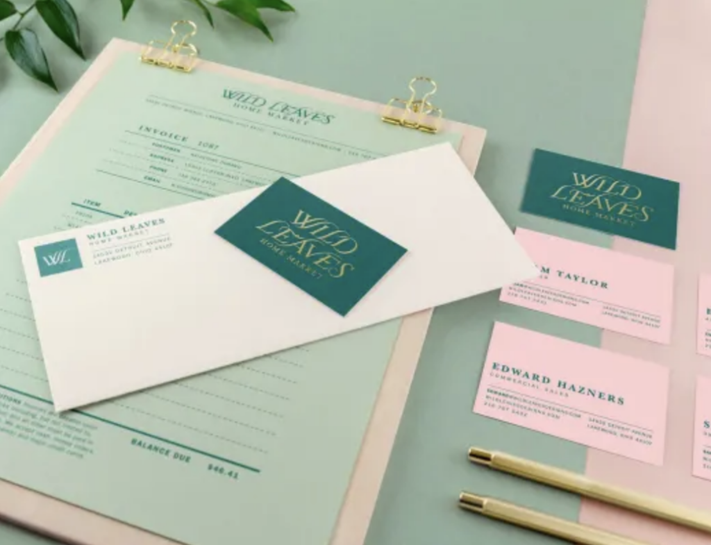 branded stationery and business cards on a desk