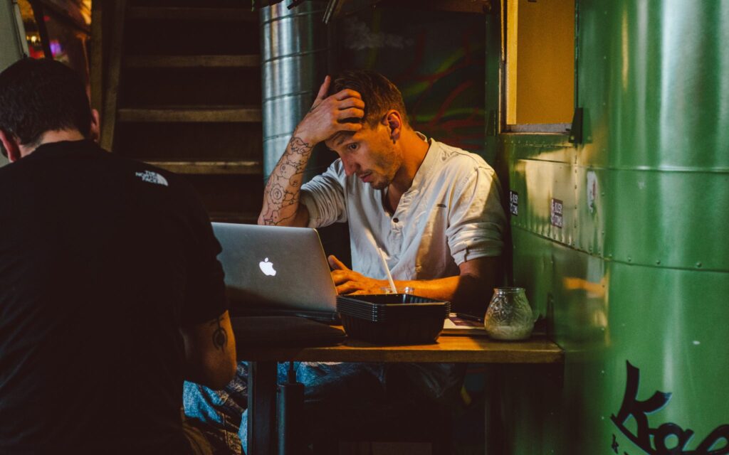 business owner looking stressed over someone copying his business idea