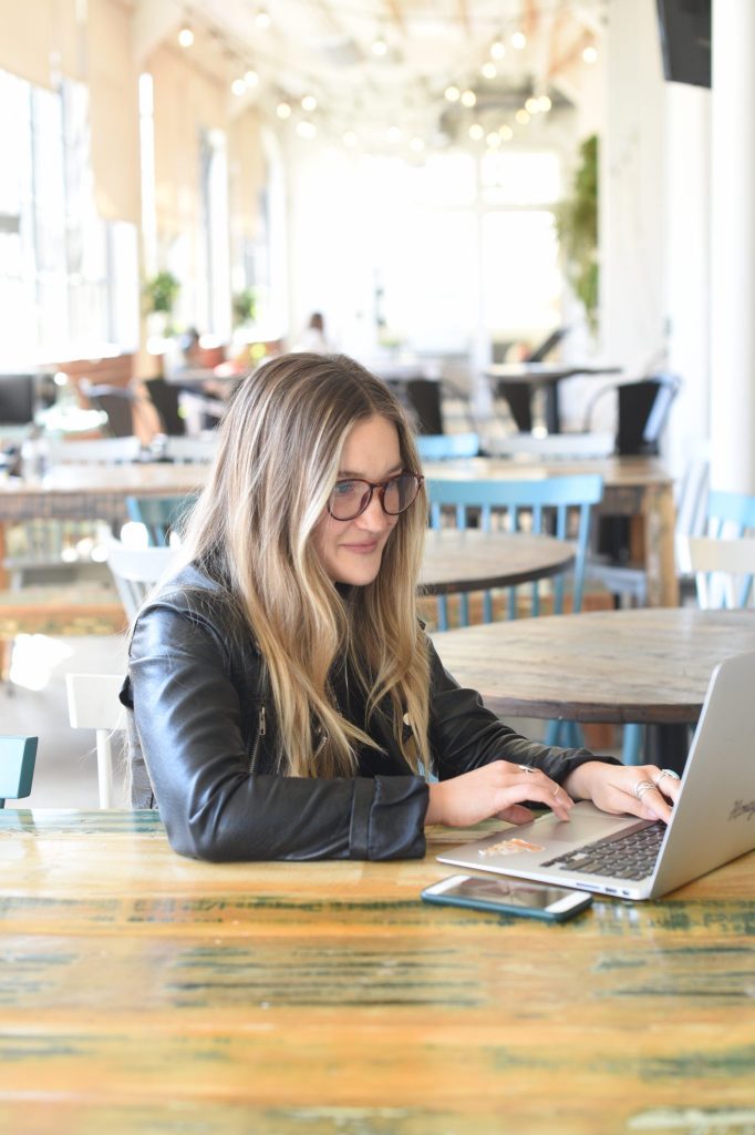 woman at her laptop learning how time management can increase productivity