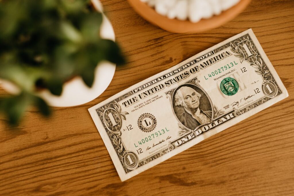 Dollar bill on table