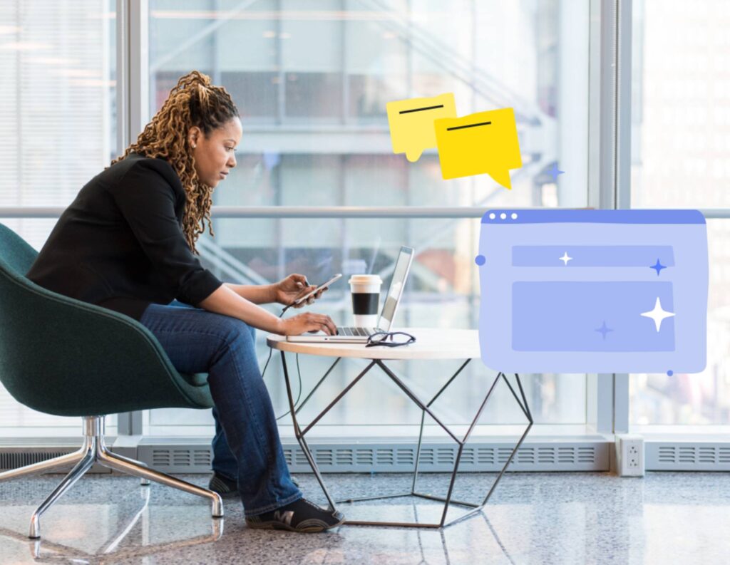 Woman sitting down at a laptop working on her brand experience