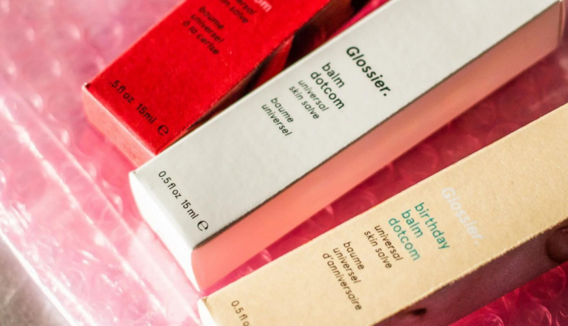 Glossier products example of cohesive branding